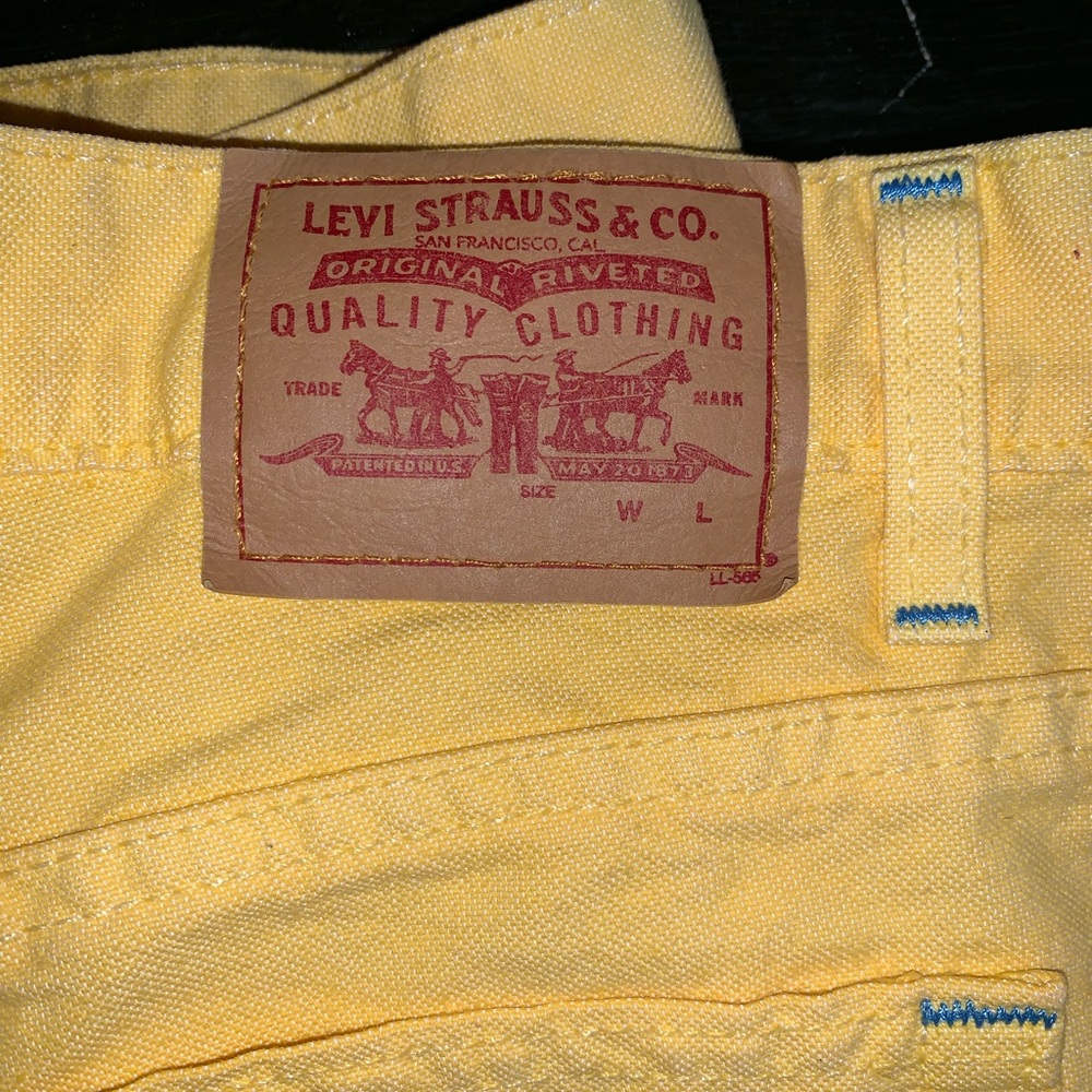 Thrifted yellow Levi shorts